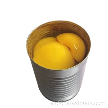 Fruta estañada Melocotón amarillo en jarabe en A10